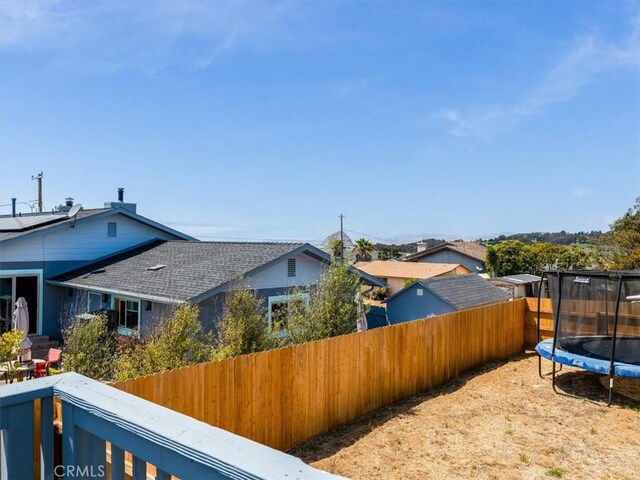 1311 15th St, Los Osos, CA 93402 - view of side of home featuring a trampoline