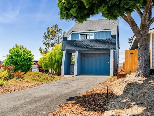 1311 15th St, Los Osos, CA 93402 - view of front of property with a garage, driveway, and roof with shingles