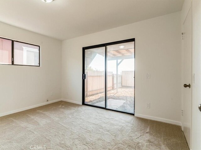 1311 15th St, Los Osos, CA 93402 - carpeted spare room featuring baseboards