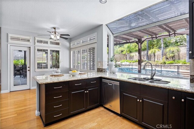 2300 Meadow View Ln, Chino Hills, CA 91709 - kitchen featuring dishwasher, a sink, a peninsula, and light wood finished floors