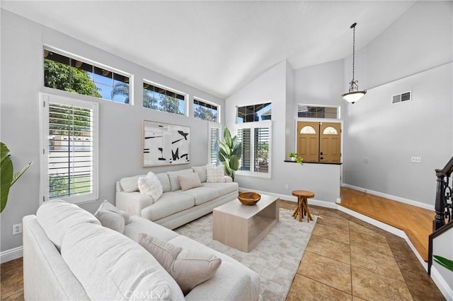 2300 Meadow View Ln, Chino Hills, CA 91709 - tiled living room featuring high vaulted ceiling and baseboards