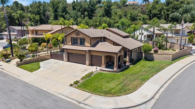 2300 Meadow View Ln, Chino Hills, CA 91709 - view of front of house with a tiled roof, a garage, driveway, stone siding, and a residential view
