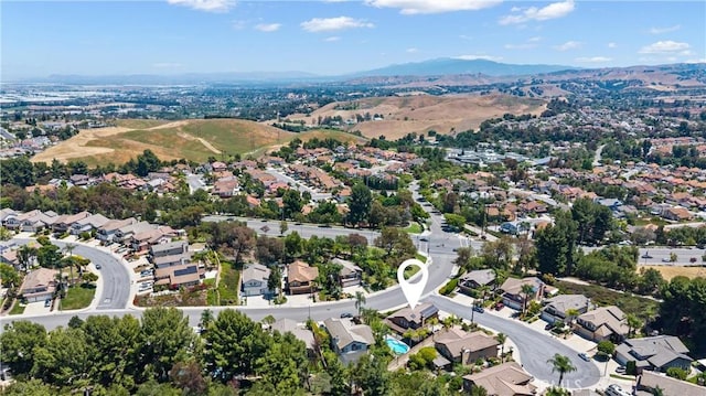 2300 Meadow View Ln, Chino Hills, CA 91709 - aerial view of property's location with nearby suburban area and a mountainous background