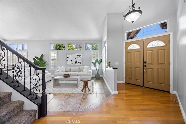 2300 Meadow View Ln, Chino Hills, CA 91709 - foyer with plenty of natural light, light wood-style floors, stairway, and baseboards