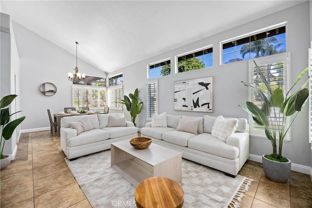 2300 Meadow View Ln, Chino Hills, CA 91709 - living room with high vaulted ceiling, a chandelier, light tile patterned floors, healthy amount of natural light, and baseboards