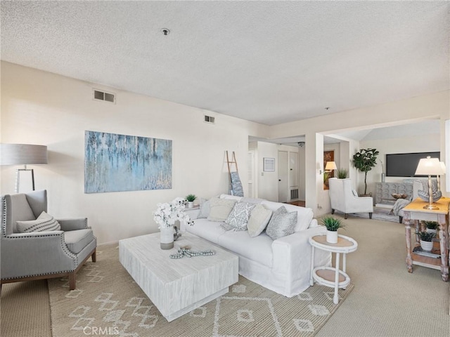 2563 Plaza Del Amo Unit 312, Torrance, CA 90503 - living room featuring carpet flooring and a textured ceiling