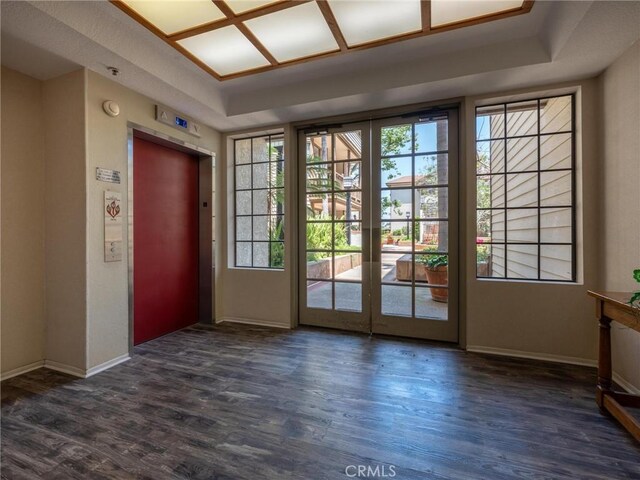 2563 Plaza Del Amo Unit 312, Torrance, CA 90503 - entryway with elevator, wood finished floors, and baseboards