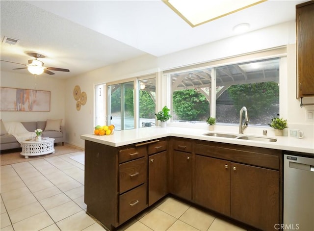 28408 Quailhill Dr, Rancho Palos Verdes, CA 90275 - kitchen with a sink, dishwasher, a peninsula, light countertops, and light tile patterned floors