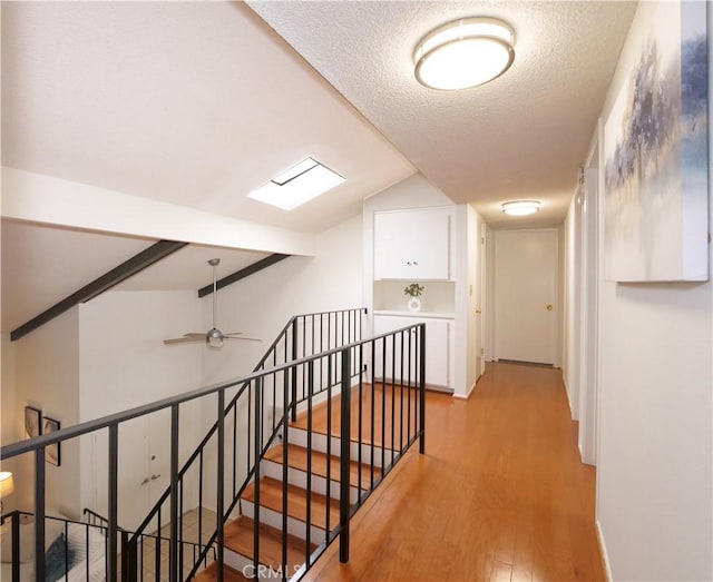 28408 Quailhill Dr, Rancho Palos Verdes, CA 90275 - hallway featuring an upstairs landing, light wood-style floors, and a textured ceiling