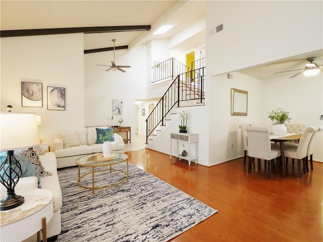 28408 Quailhill Dr, Rancho Palos Verdes, CA 90275 - living room featuring a ceiling fan, stairway, wood finished floors, high vaulted ceiling, and beam ceiling