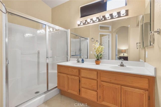 26835 Eclipse Dr, Menifee, CA 92585 - bathroom with a shower stall, double vanity, and tile patterned floors