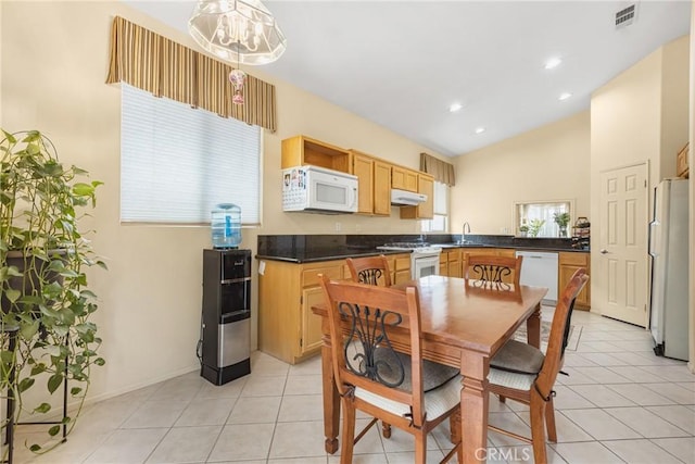 26835 Eclipse Dr, Menifee, CA 92585 - dining room featuring light tile patterned floors, recessed lighting, baseboards, and lofted ceiling