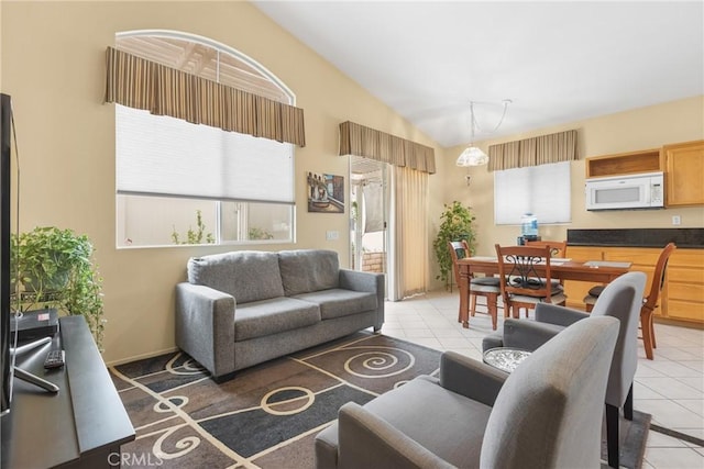 26835 Eclipse Dr, Menifee, CA 92585 - living room with light tile patterned floors and vaulted ceiling