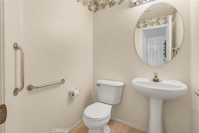 26835 Eclipse Dr, Menifee, CA 92585 - bathroom featuring toilet, tile patterned floors, and baseboards