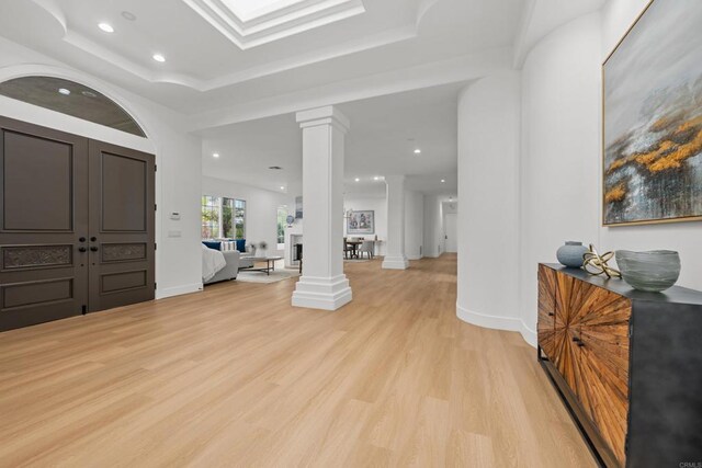 18150 Via Ascenso, Rancho Santa Fe, CA 92067 - entrance foyer featuring decorative columns, light wood-type flooring, recessed lighting, baseboards, and a raised ceiling