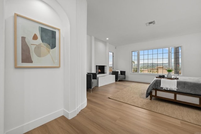 18150 Via Ascenso, Rancho Santa Fe, CA 92067 - bedroom with wood finished floors, baseboards, a fireplace, and recessed lighting