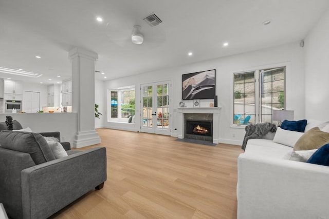 18150 Via Ascenso, Rancho Santa Fe, CA 92067 - living room featuring decorative columns, light wood-type flooring, recessed lighting, and french doors