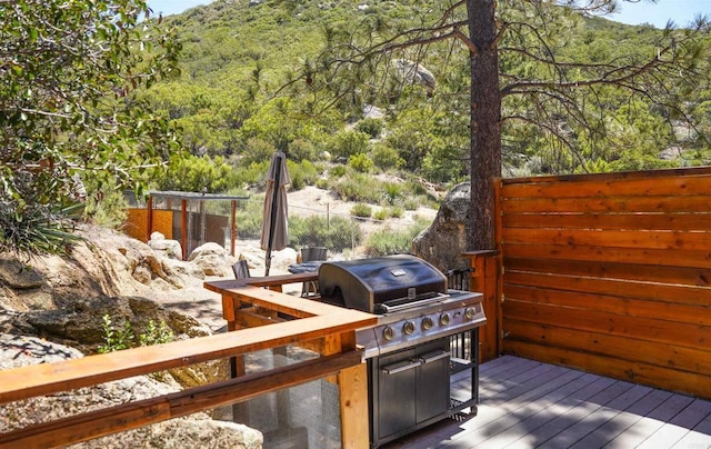 8637 Ponderosa Ln, Pine Valley, CA 91962 - wooden terrace with a view of trees and a grill