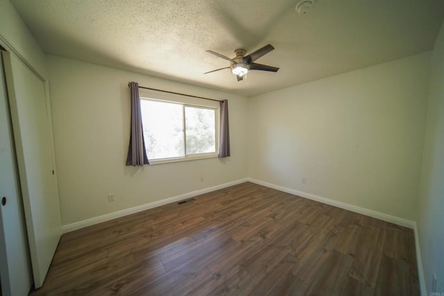 8637 Ponderosa Ln, Pine Valley, CA 91962 - spare room with ceiling fan, dark wood-style floors, baseboards, a smoke detector, and a textured ceiling