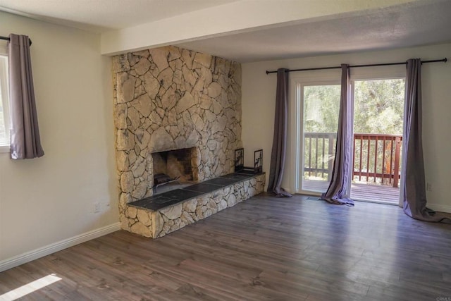 8637 Ponderosa Ln, Pine Valley, CA 91962 - unfurnished living room featuring a fireplace, wood finished floors, and baseboards