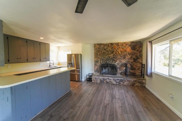 8637 Ponderosa Ln, Pine Valley, CA 91962 - kitchen featuring stainless steel fridge with ice dispenser, a sink, light countertops, and a peninsula