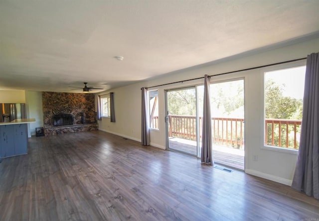 8637 Ponderosa Ln, Pine Valley, CA 91962 - unfurnished living room featuring a ceiling fan, healthy amount of natural light, dark wood-style flooring, and baseboards