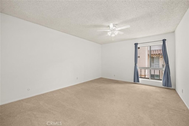 1127 E Del Mar Blvd Unit 235, Pasadena, CA 91106 - carpeted empty room featuring a ceiling fan, a textured ceiling, and baseboards