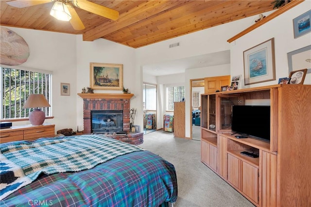 908 Knickerbocker Rd, Big Bear Lake, CA 92315 - bedroom with light colored carpet, wood ceiling, a brick fireplace, and ceiling fan