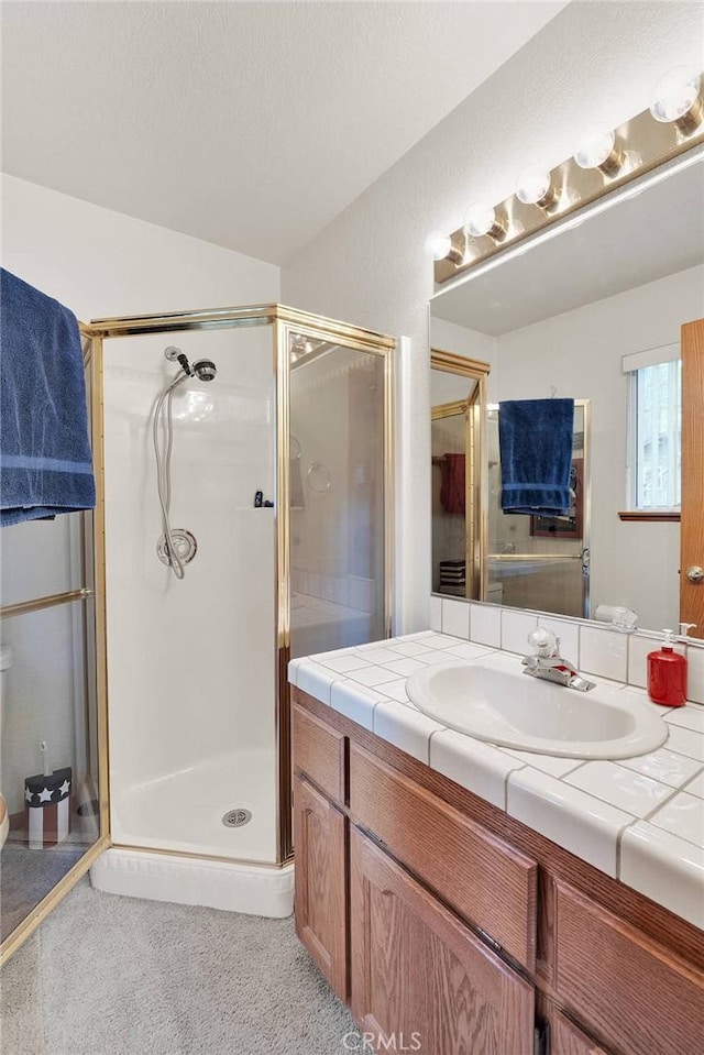 908 Knickerbocker Rd, Big Bear Lake, CA 92315 - full bath with a stall shower, vanity, and toilet