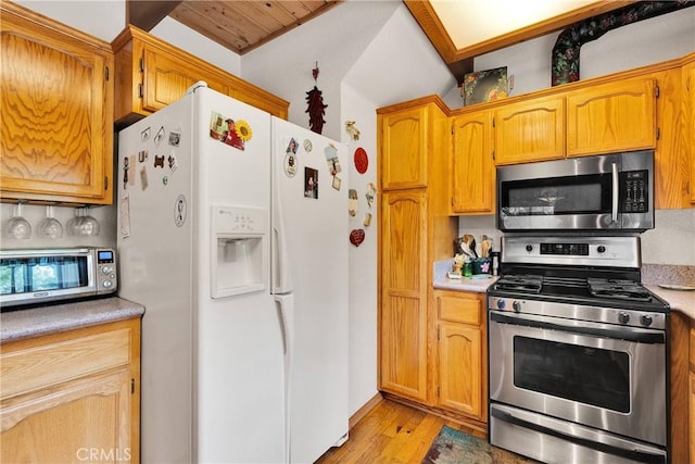 908 Knickerbocker Rd, Big Bear Lake, CA 92315 - kitchen featuring stainless steel appliances, light wood-type flooring, light countertops, and brown cabinets