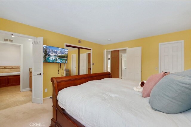 24092 Lapwing Ln, Laguna Niguel, CA 92677 - bedroom featuring light carpet, baseboards, and connected bathroom