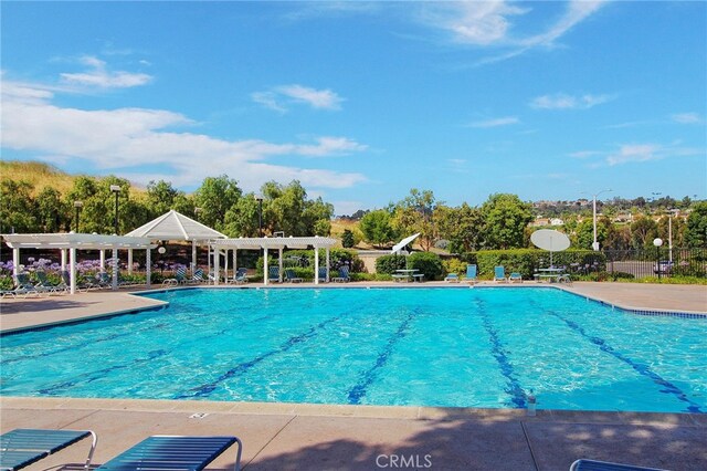 24092 Lapwing Ln, Laguna Niguel, CA 92677 - community pool featuring a pergola and a patio area