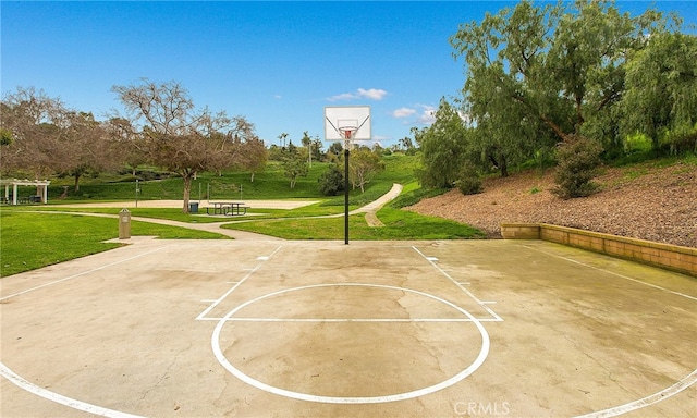 24092 Lapwing Ln, Laguna Niguel, CA 92677 - view of basketball court with community basketball court and a lawn