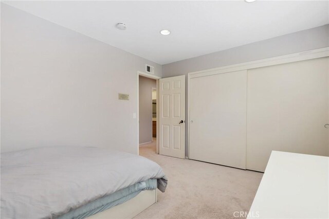 24092 Lapwing Ln, Laguna Niguel, CA 92677 - bedroom featuring light colored carpet, a closet, and recessed lighting