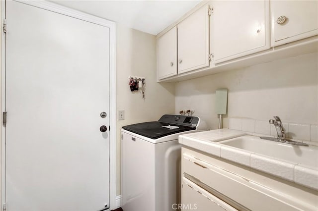 24092 Lapwing Ln, Laguna Niguel, CA 92677 - laundry area featuring washer / clothes dryer and cabinet space