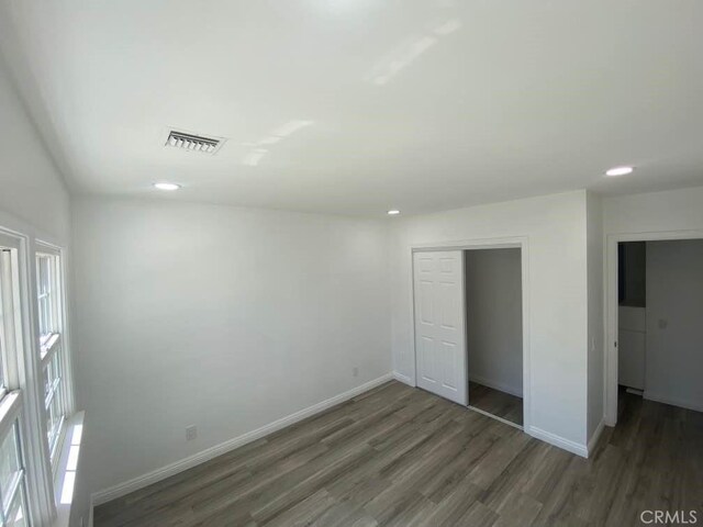 1515 Elizabeth St, Redlands, CA 92373 - unfurnished bedroom featuring wood finished floors, baseboards, recessed lighting, and a closet