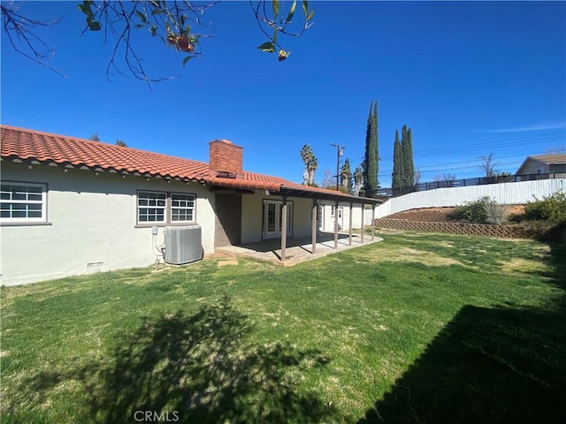 1515 Elizabeth St, Redlands, CA 92373 - rear view of property with a patio, a chimney, cooling unit, stucco siding, and a tile roof