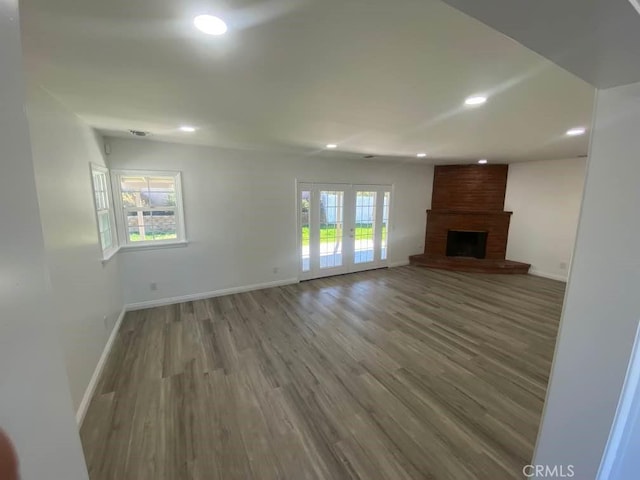 1515 Elizabeth St, Redlands, CA 92373 - unfurnished living room featuring recessed lighting, baseboards, wood finished floors, and a fireplace