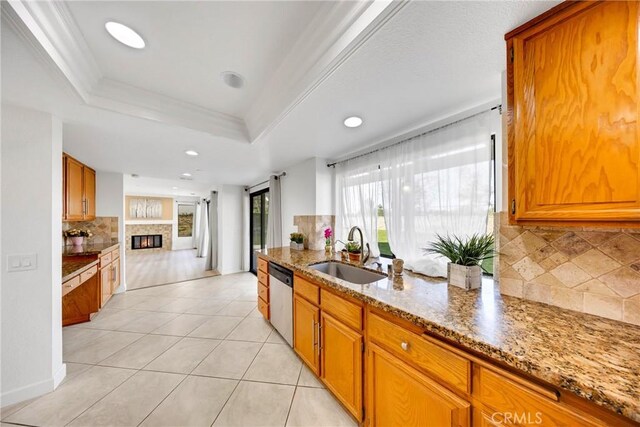 867 Winding Brook Ln, Walnut, CA 91789 - kitchen featuring a sink, dishwasher, tasteful backsplash, brown cabinetry, and recessed lighting