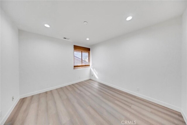 867 Winding Brook Ln, Walnut, CA 91789 - empty room with recessed lighting, light wood finished floors, and baseboards