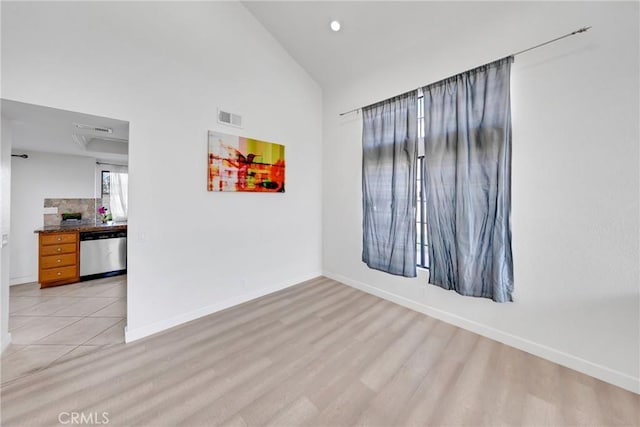 867 Winding Brook Ln, Walnut, CA 91789 - unfurnished room featuring baseboards, light wood-style flooring, and high vaulted ceiling