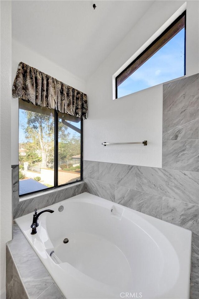 867 Winding Brook Ln, Walnut, CA 91789 - full bathroom featuring a bath and healthy amount of natural light
