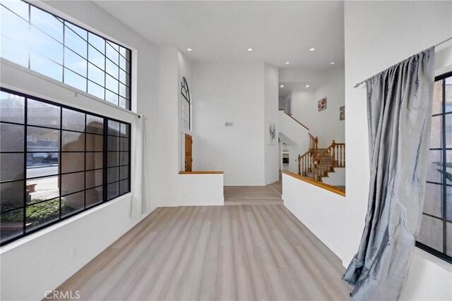 867 Winding Brook Ln, Walnut, CA 91789 - foyer entrance with carpet floors, stairway, a high ceiling, and recessed lighting