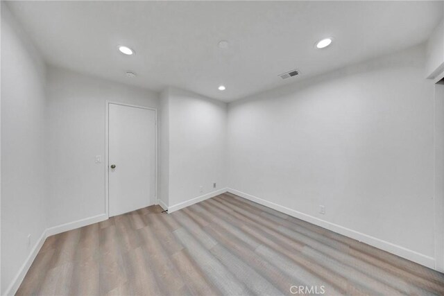 867 Winding Brook Ln, Walnut, CA 91789 - unfurnished room with recessed lighting, wood finished floors, baseboards, and a smoke detector