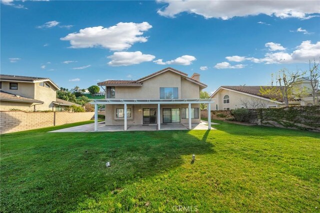 867 Winding Brook Ln, Walnut, CA 91789 - rear view of house with a patio area and stucco siding