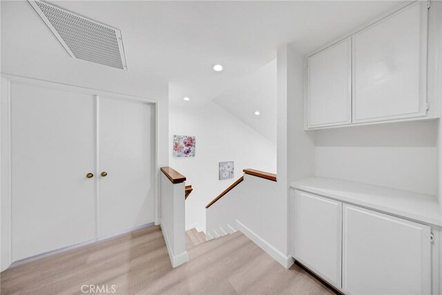 867 Winding Brook Ln, Walnut, CA 91789 - hall featuring an upstairs landing, light wood finished floors, recessed lighting, and lofted ceiling