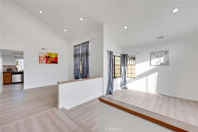 867 Winding Brook Ln, Walnut, CA 91789 - unfurnished living room with light wood-type flooring, baseboards, recessed lighting, and high vaulted ceiling