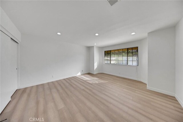 867 Winding Brook Ln, Walnut, CA 91789 - spare room featuring recessed lighting, light wood-type flooring, and baseboards