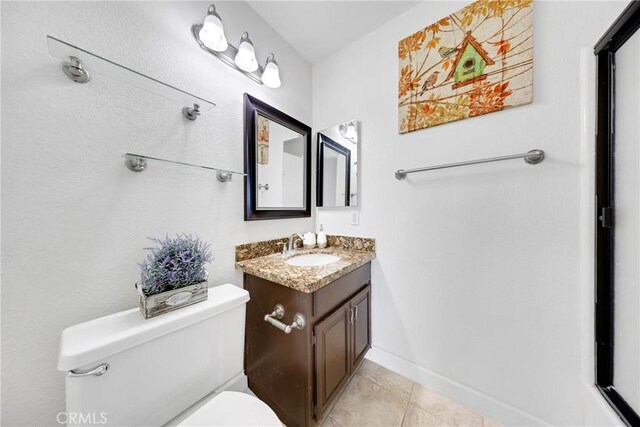 867 Winding Brook Ln, Walnut, CA 91789 - bathroom with toilet, vanity, tile patterned floors, and baseboards