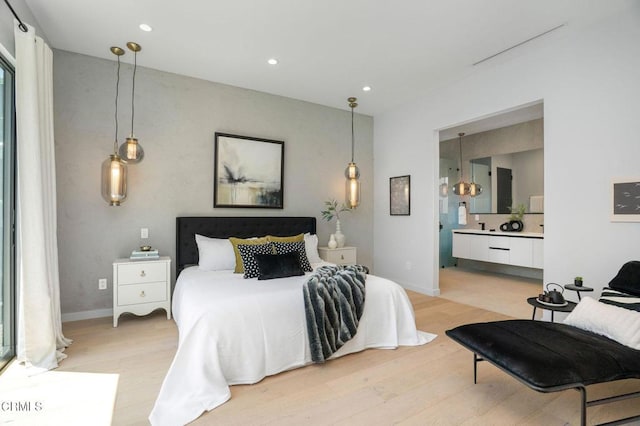 5622 Natick Ave, Sherman Oaks, CA 91411 - bedroom with light wood finished floors, recessed lighting, ensuite bathroom, and baseboards